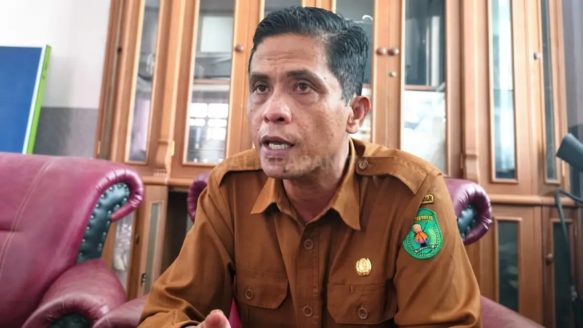Kepala Dinas Koperasi dan UKM Kutai Timur Marhadyn saat membahas program bantuan permodalan Rp25 juta bagi UMKM.