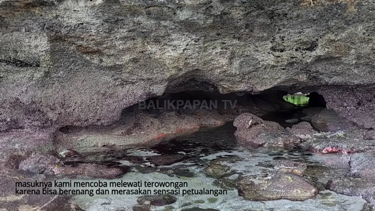 Terowongan karang menjadi akses unik menuju Laguna Kehe Daing saat kondisi air laut surut.