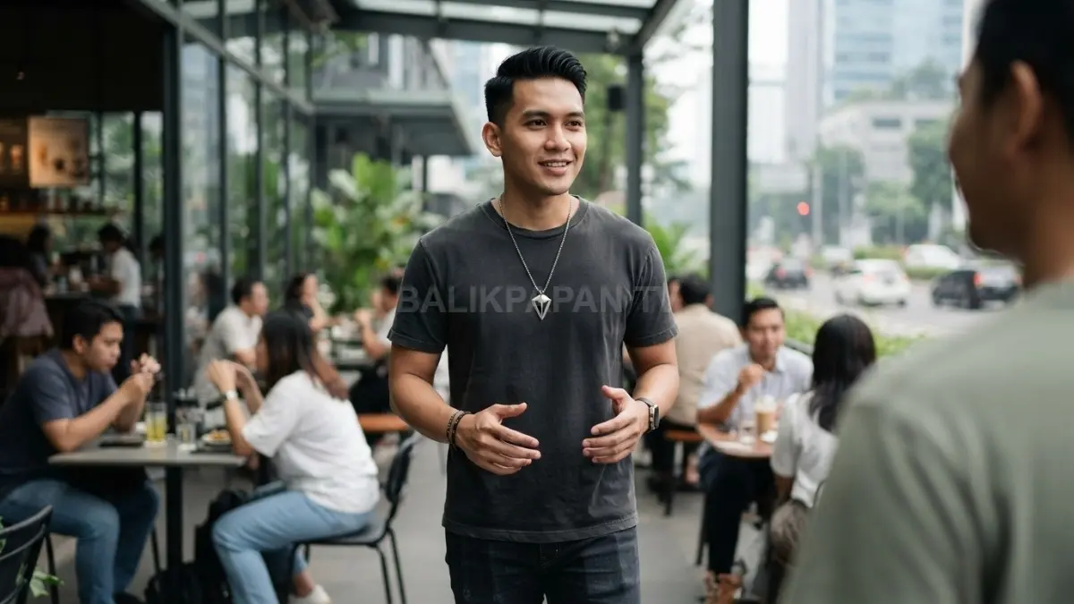 Kaus hitam polos dipadukan aksesori leher geometris atau metalik memberi kontras stylish tanpa berlebihan. (BTV/AI)
