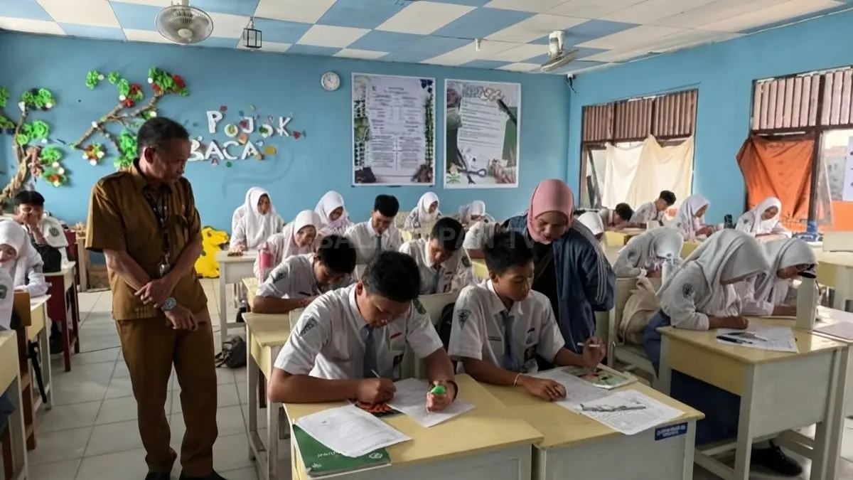 Skor TKA SMA memakai rentang 200–800, dengan predikat istimewa mulai 725 serta kategori capaian kemampuan. (YUNI/RADAR SAMPIT)