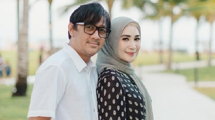 Andre Taulany bersama Erin.
