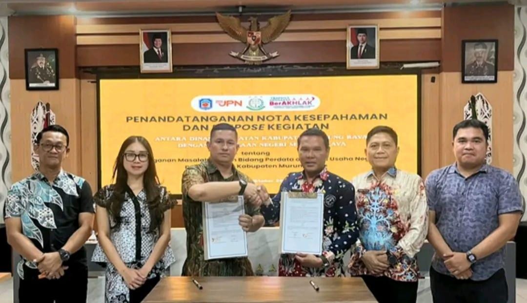 Penandatanganan Nota Kesepahaman (MoU) terkait penanganan masalah hukum di bidang perdata dan tata usaha negara (TUN). HUMAS MURUNG RAYA