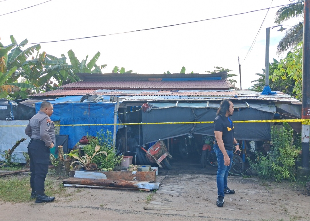 Bengkel lokasi pembunuhan.AGUS PRAMONO/KALTENGPOS.JAWAPOS.COM