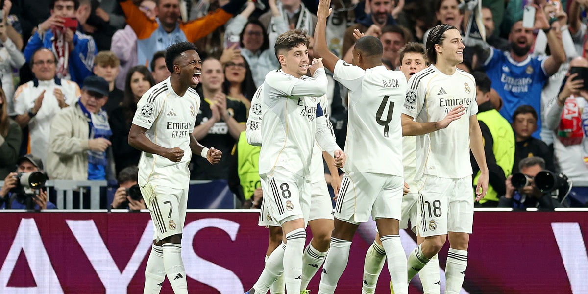 Para pemain Real Madrid berselebrasi usai mencetak gol ke gawang Benfica pada leg kedua play-off Liga Champions 2025/2026, Kamis (26/02/2026) dini hari WIB.  (Sumber: @AFP)