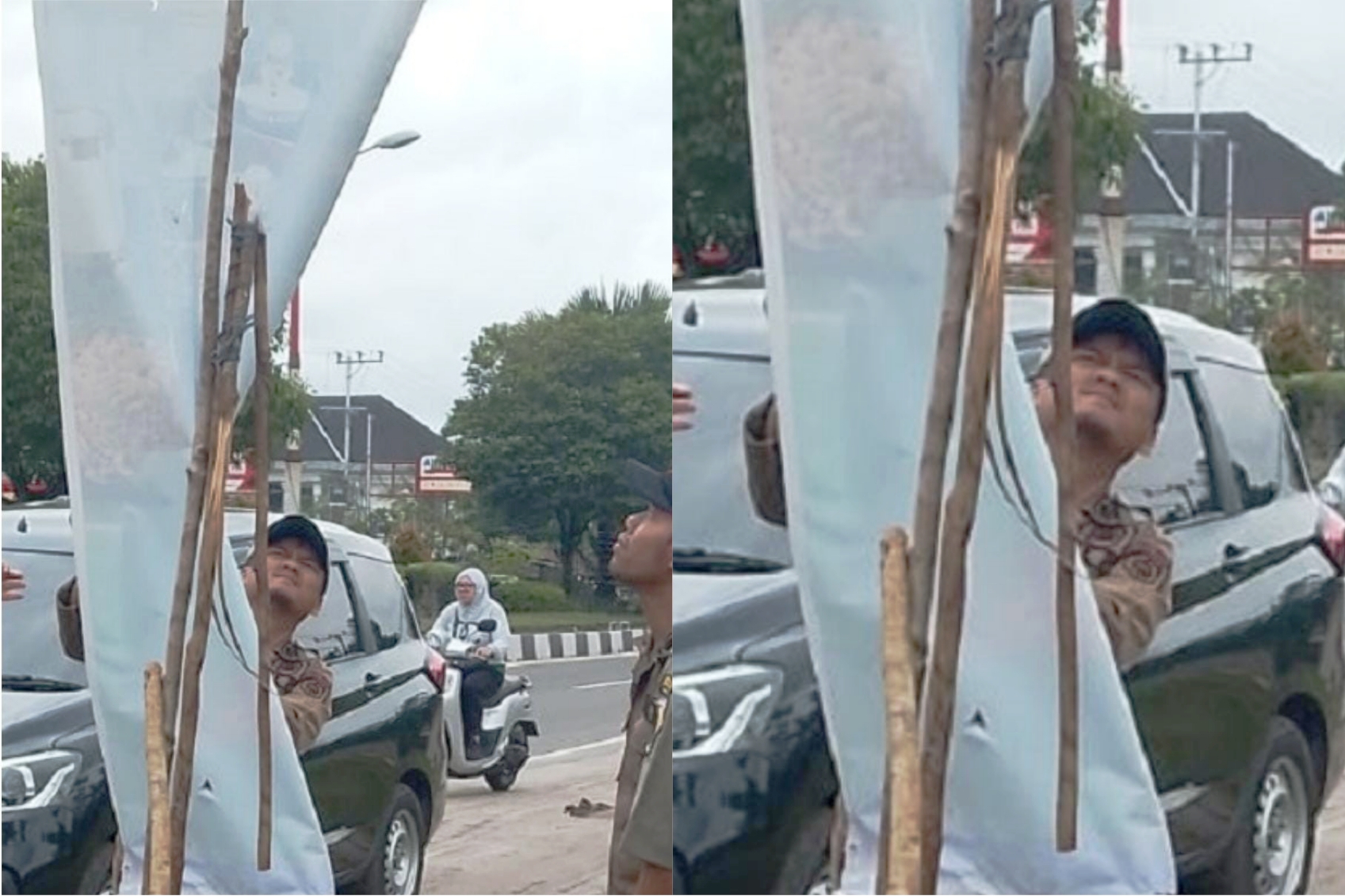 Satpol PP Palangka Raya menurunkan reklame terlarang. SATPOL PP