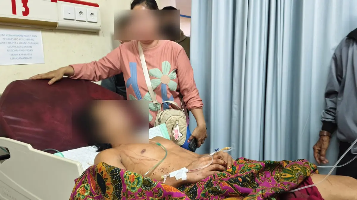 Alfian, korban selamat dalam perawatan.Warga