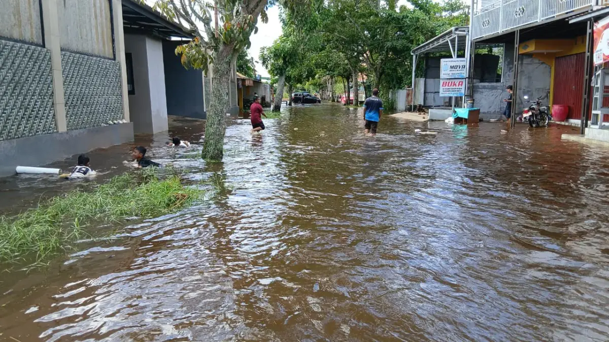 Banjir di permukiman Sampit.Miftah/kaltengpos.jawapos.com