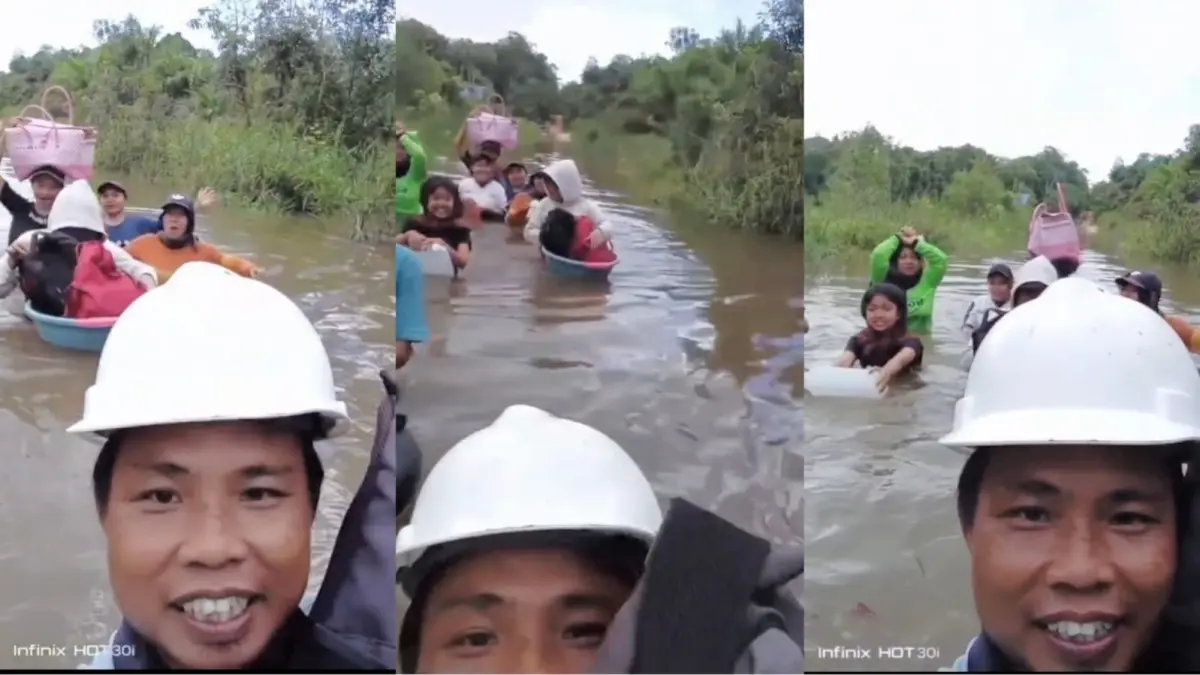 Tangkapan gambar video warga yang menerobos banjir di Desa Tanjung Jariangau. WARGA