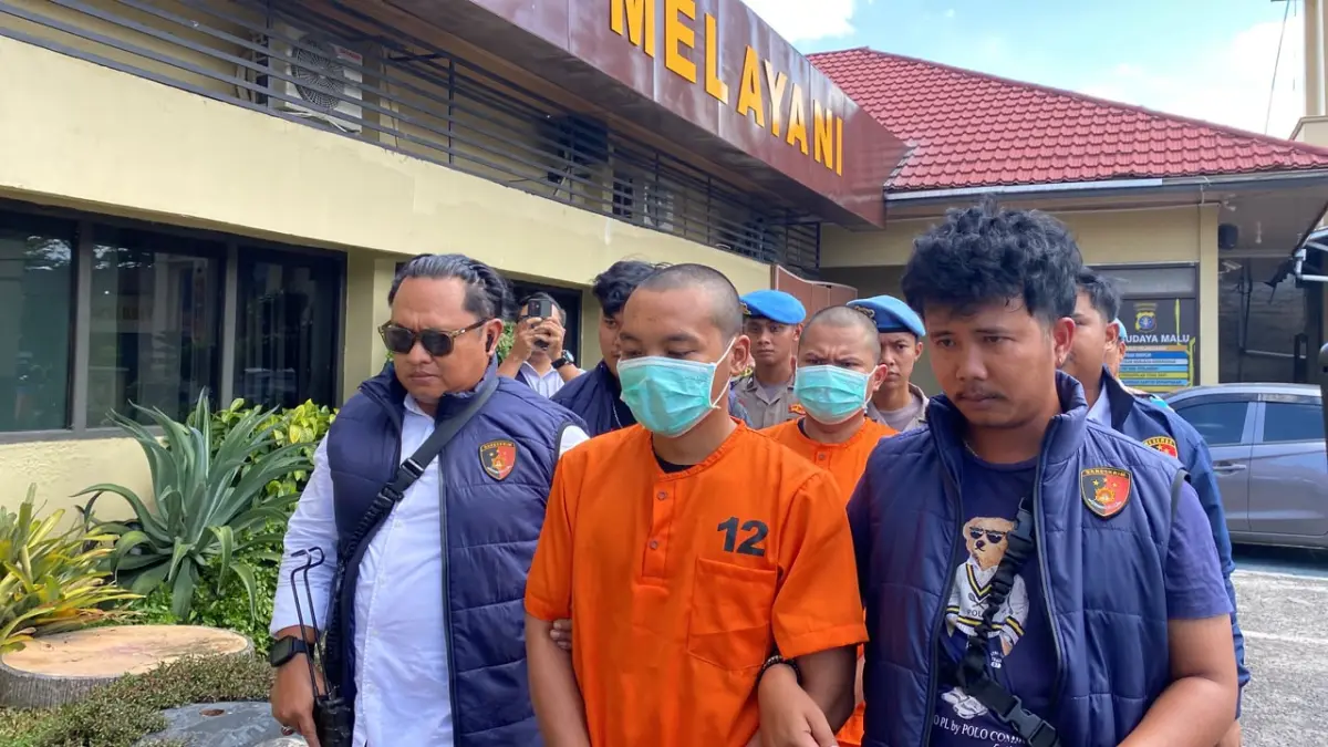 Dua tersangka melakukan pembunuhan dan pengeroyokan di Kuala Kuayan.(Miftah/kaltengpos.jawapos.com)