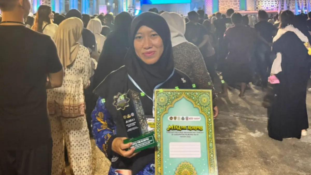 Nor Faridatunnisa menjadi juara 1 pada MTQ KORPRI VIII Kalteng.(Dok Pribadi)