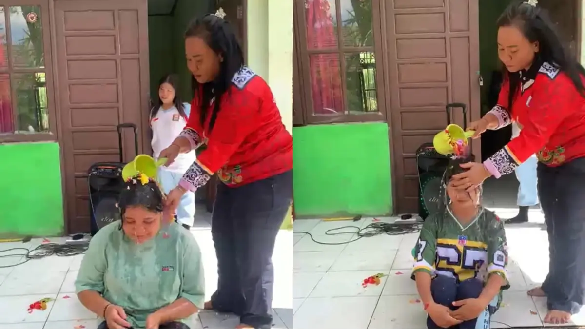 Siswa baru disambut dengan siaman.(Screenshoot)