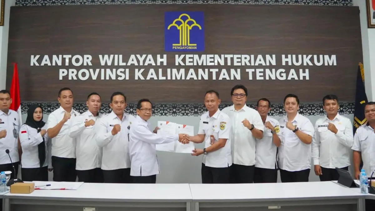 Kakanwil Kemenkum Kalteng saat menerima kunjungan dari pihak Pemkab Gumas.(Humas)