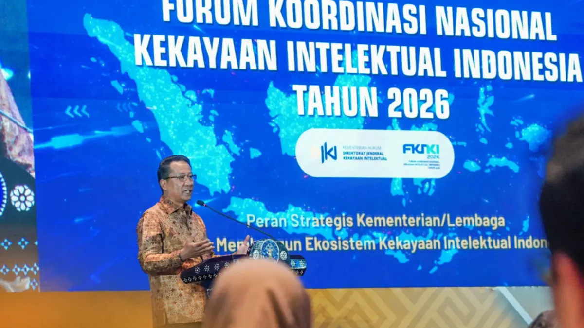 Menkum saat menyampaikan sambutan