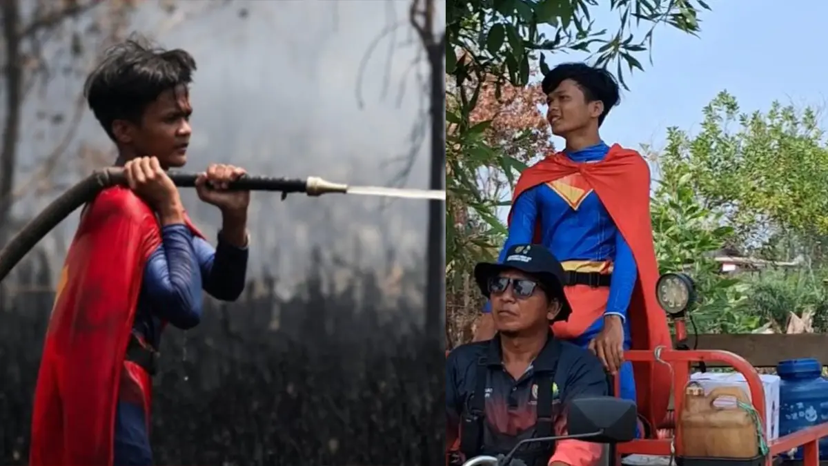 Rudiyansah, remaja asal Petuk Katimpun mengenakan kostum superman.(Agus Pramono/kaltengpos.jawapos.com)