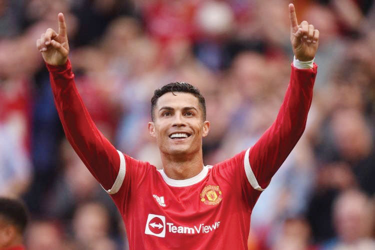 DUA GOL : Cristiano Ronaldo merayakan gol kedua yang dia cetak ke gawang Newcastle United di Old Trafford, Sabtu (11/9) malam WIB. (OLI SCARFF/AFP/JAWAPOS.COM)