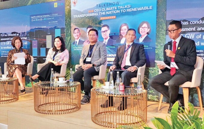 KEBERSAMAAN : Direktur Utama PLN Darmawan Prasodjo (kanan) saat memaparkan skema ARED di sesi talkshow di Pavilion Indonesia COP28, Dubai, Uni Emirat Arab, belum lama ini.