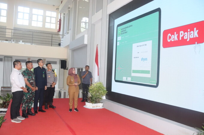 Pj Bupati Pulang Pisau Hj Nunu Andriani melakukan launching sistem informasi pajak daerah V-Tax dan launching layanan jejak daerah, Selasa (3/9/2024).