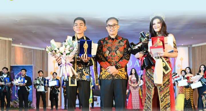 HADIR : Asisten Pemerintahan dan Kesra, Triadi Ej (tengah) disela-sela kegiatannya saat menghadiri kegiatan Malam Penobatan Bujang Dara Tahun 2024, belum lama ini.
