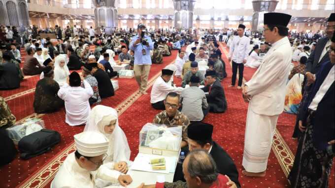 Nikah massal yang dilaksanakan Kemenag RI di Masjid Istiqlal, Jakarta, Sabtu (28/6/2025).