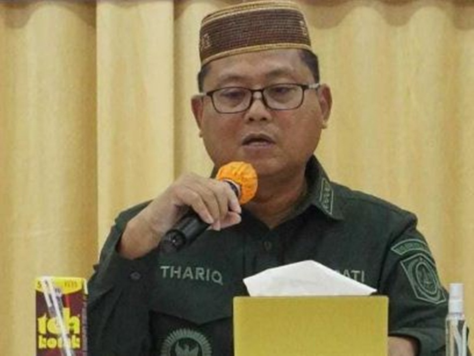 Bupati Gorontalo Utara Thariq Modanggu (kanan)