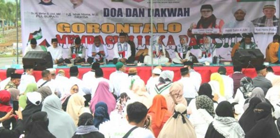 Aksi Solidaritas dan Doa Bersama Untuk Palestina yang digelar di Kawasan Center Point,   Kecamatan Tilongkabila. (F. Yudi/Sespri)