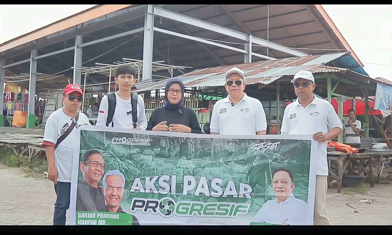 Aksi pasar relawan Progresif wilayah Gorontalo di Pasar shoping Limboto (F:dok Progresif)