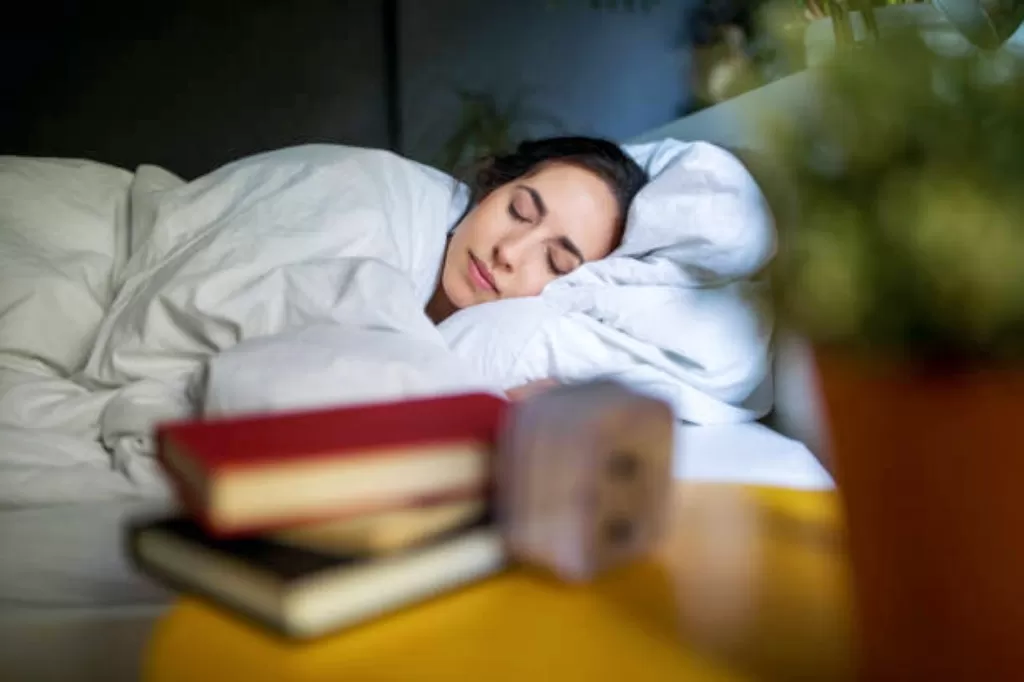 Ilustrasi perempuan sedang tidur. (Getty Images/Luis Alvarez)