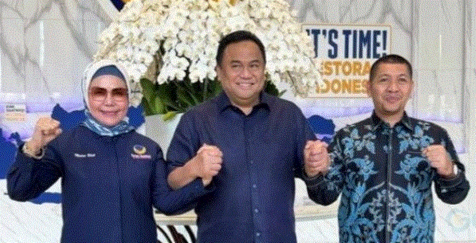 Pasangan calon Merlan Uloli dan Syamsu Botutihe bersama Rachmat Gobel (F:istimewa)