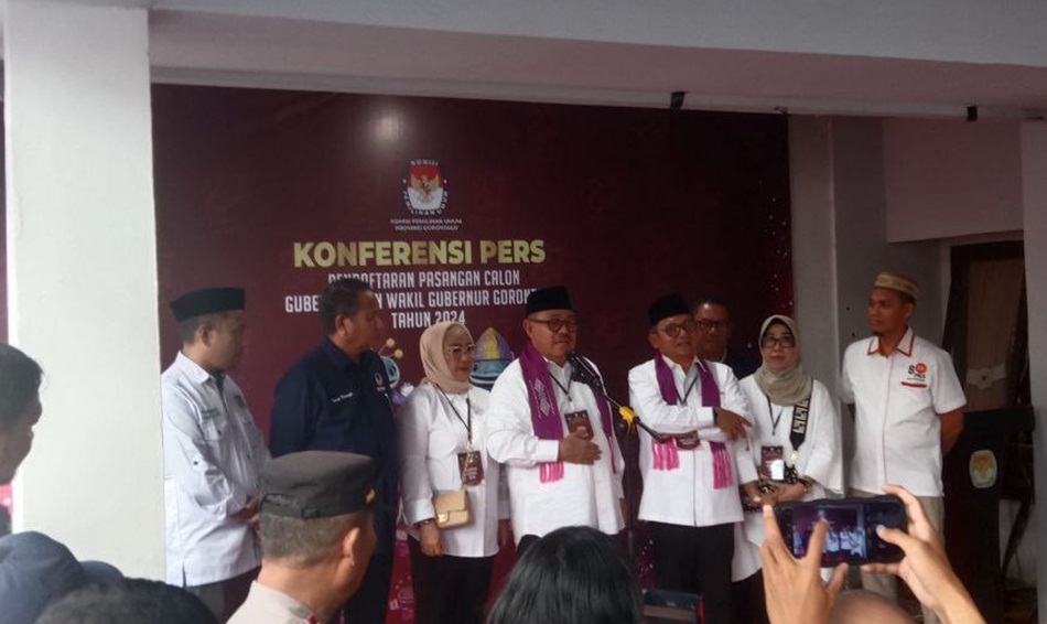 Tonny Uloli dan Marten Taha saat mendaftar kembali  di KPU (F:GP)