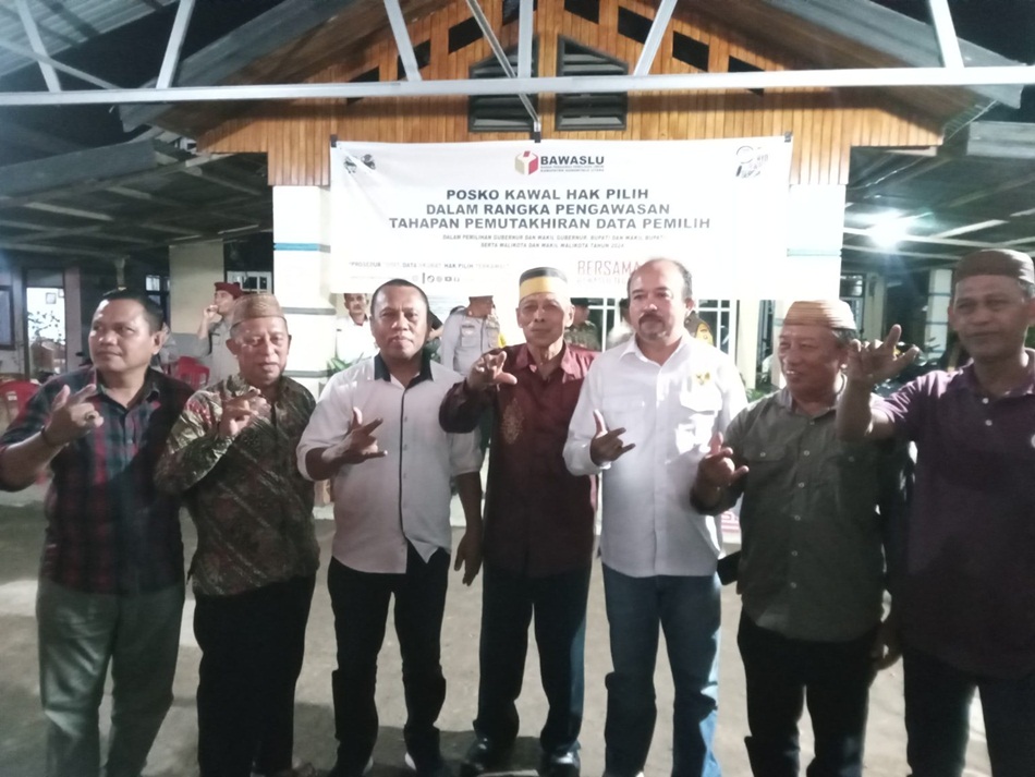 paslon Ridwan Yasin - Mukhsin Badar usai menghadiri putusan Bawaslu. (F:ist)