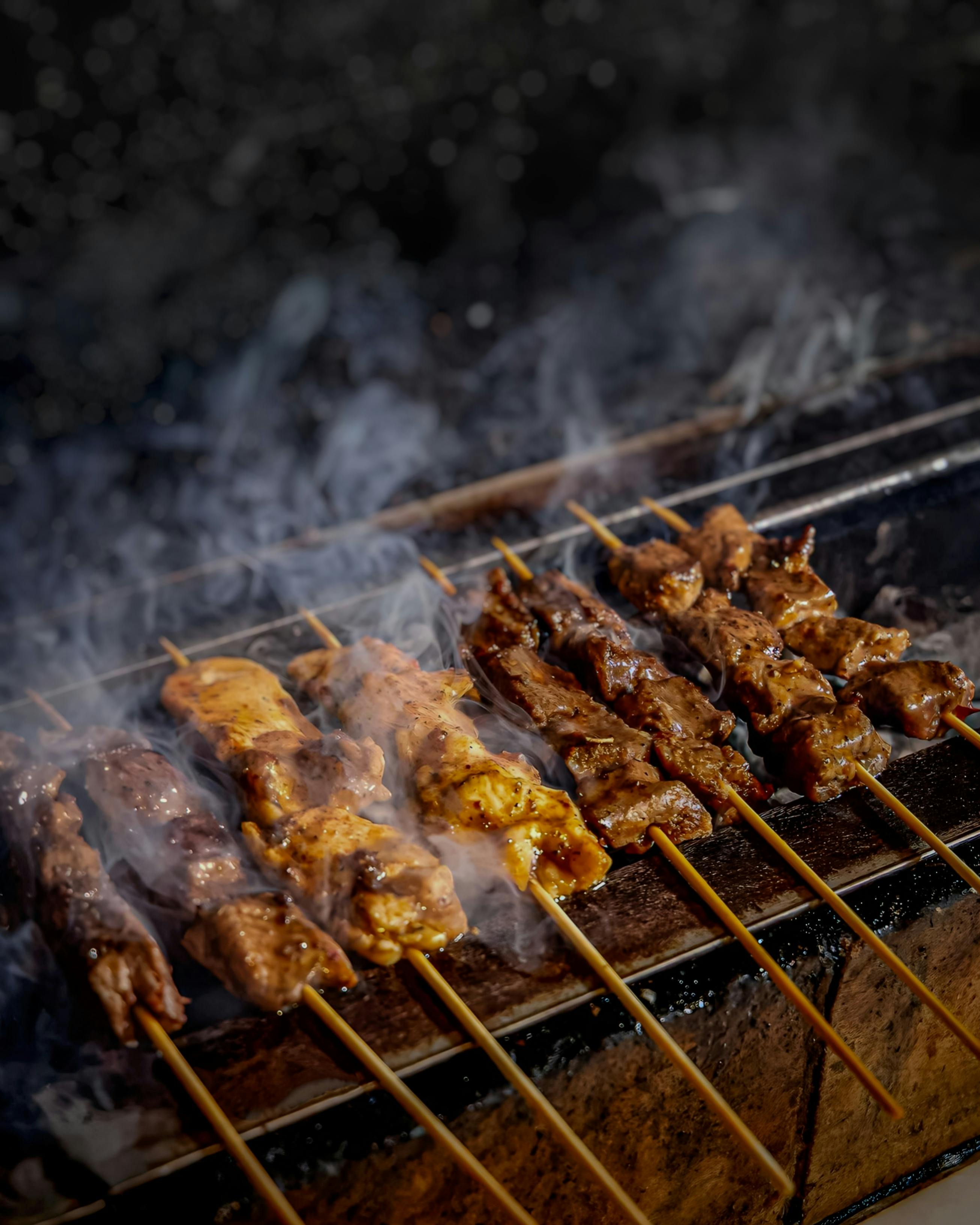 sate yang sedang dibakar
