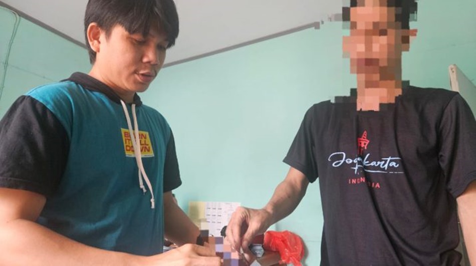 pria berinisial RMS saat menjalani pemeriksaan di Polresta Gorontalo.(F:hms-Pol)