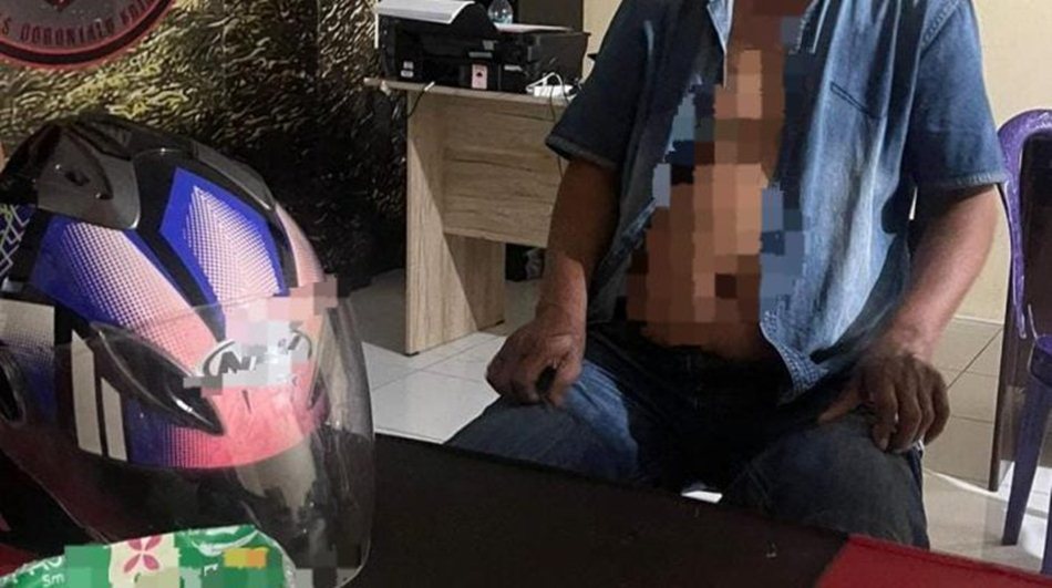 Pelaku seorang pria berinisial A.H. (63), warga Kelurahan Biawu, Kecamatan Kota Selatan saat diamankan Polisi (F:hms-Pol)