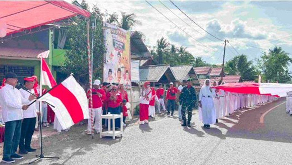 Semarak kemerdekaan terasa kental di Kecamatan Randangan saat ribuan warga ikut serta dalam Kirab Merah Putih memperingati HUT ke-80 Republik Indonesia.(F:Ist)