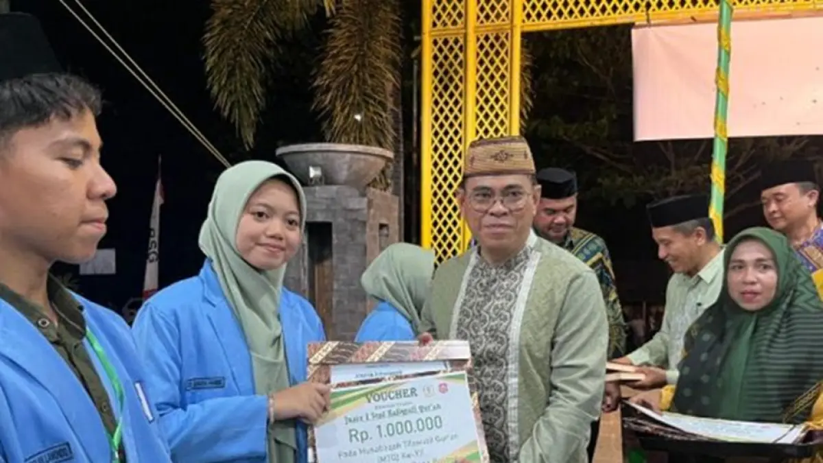 Sekda Bone Bolango Iwan Mustapa saat mmenurutp kegiatan mengatakan MTQ tahun ini sukses mencetak peserta terbaik yang akan bertarung di tingkat provinsi.(F:Dkmfo)