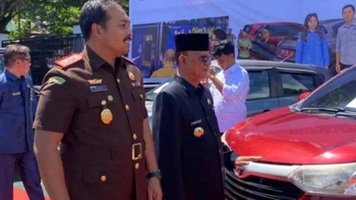 Kejari Bone Bolango dan Bupati Imset Mile.(F:Dkmfo)