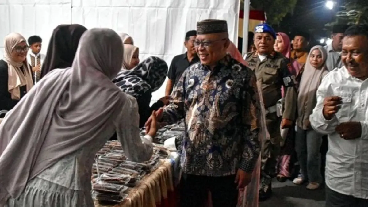 Bupati Gorontalo Sofyan Puhi memuka Festival Tutulu merupakan salah satu warisan budaya yang memiliki nilai penting dalam menjaga identitas masyarakat sekaligus memperkuat syiar Islam.(F:Dkmfo)