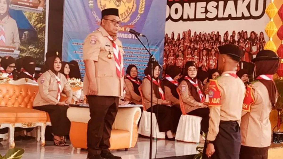 Sekretaris Daerah Kabupaten Gorontalo, Sugondo Makmur, saat membuka Perkemahan Penerimaan Tamu Ambalan (PTA) Gugus Depan 01.003–01.004 Pangkalan SMA Negeri 1 Limboto.(F:Diskominfo)