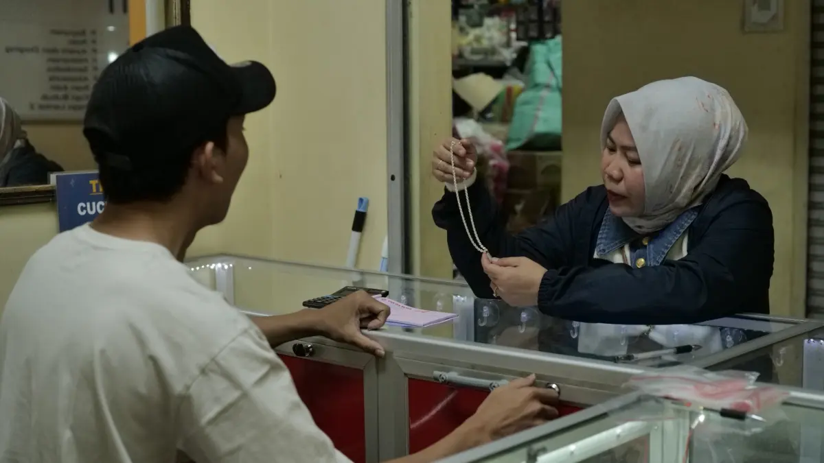 Dewi Natalia, Mantri BRI yang telah mengabdi 15 tahun.