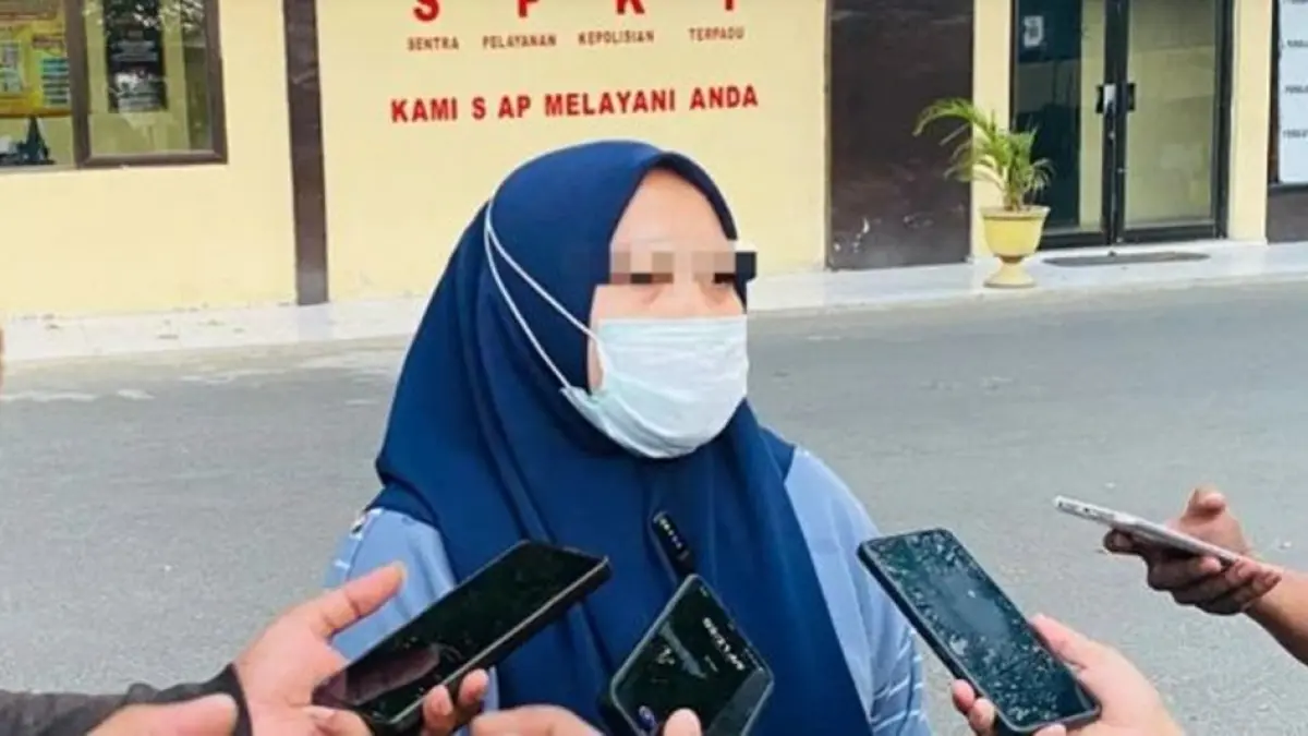 UM (33), mantan karyawan salah satu SPPG, melaporkan RS yang disebut sebagai kepala SPPG ke Polda Gorontalo atas dugaan pelecehan seksual.(F:Istimewa)