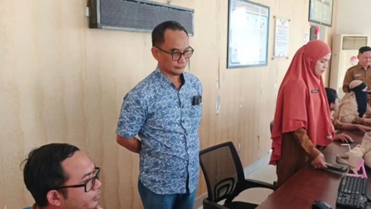 Tim Audit PT TSI (Tim Sertifikasi Internasional) bersama Tim PIAK Dukcapil Kementerian Dalam Negeri saat berada di Dukcapil Bone Bolango.(F:Diskominfp)