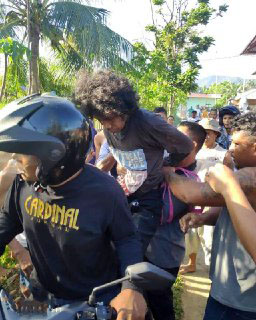 LK alias Karimu si Kolor Ijo, saat diciduk polisi dari kediamannya, Sabtu (20/2).