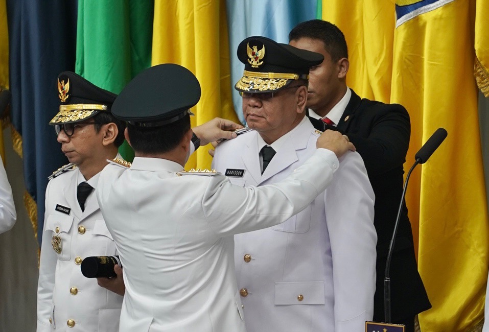 Menteri Dalam Negeri Tito Karnavian saat melantik Harisson sebagai Pj Gubernur Kalbar di Kantor Kementrian Dalam Negeri, Jakarta, (5/9).