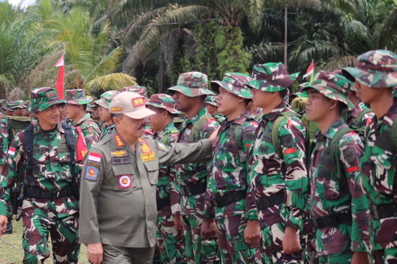 TMMD : Wakil Bupati Sanggau, Yohanes Ontot saat menghadiri opening ceremony TMMD Ke-118 Di Desa Kunyil, Kecamatan Meliau. Program TMMD tersebut bakal dilaksanakan selama 30 hari ke depan.