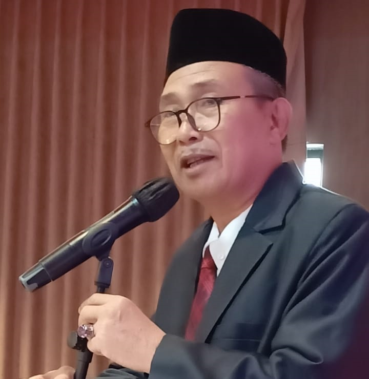 Dr. Erdi, M.Si