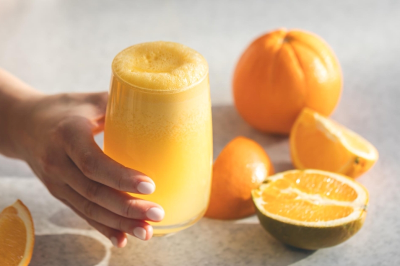 Ilustrasi smoothie buah jeruk.