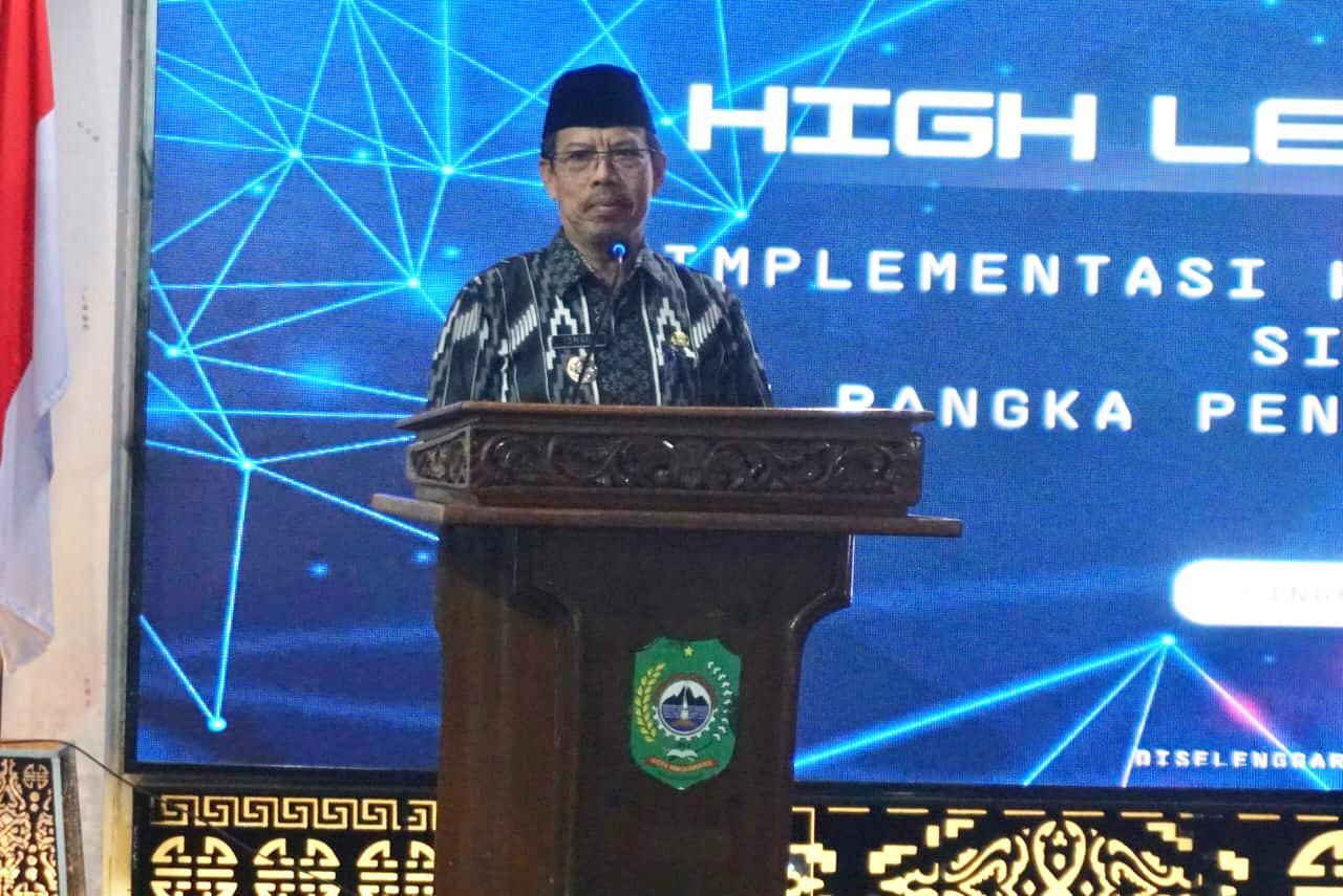 Pj Bupati Ismail saat menghadiri High Level Meeting (HLM) di Singkawang.