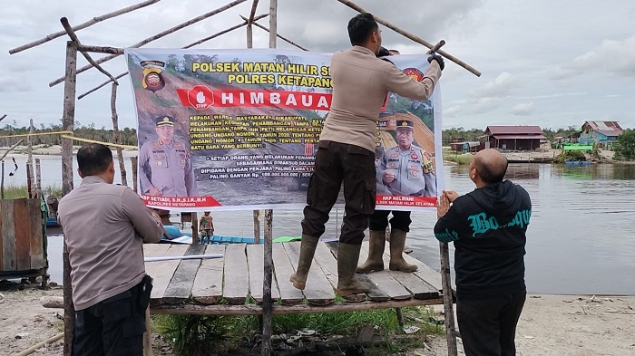 IMBAUAN: Polisi memasang baliho imbauan larangan PETI di sejumlah titik di Kecamatan Matan Hilir Selasan.