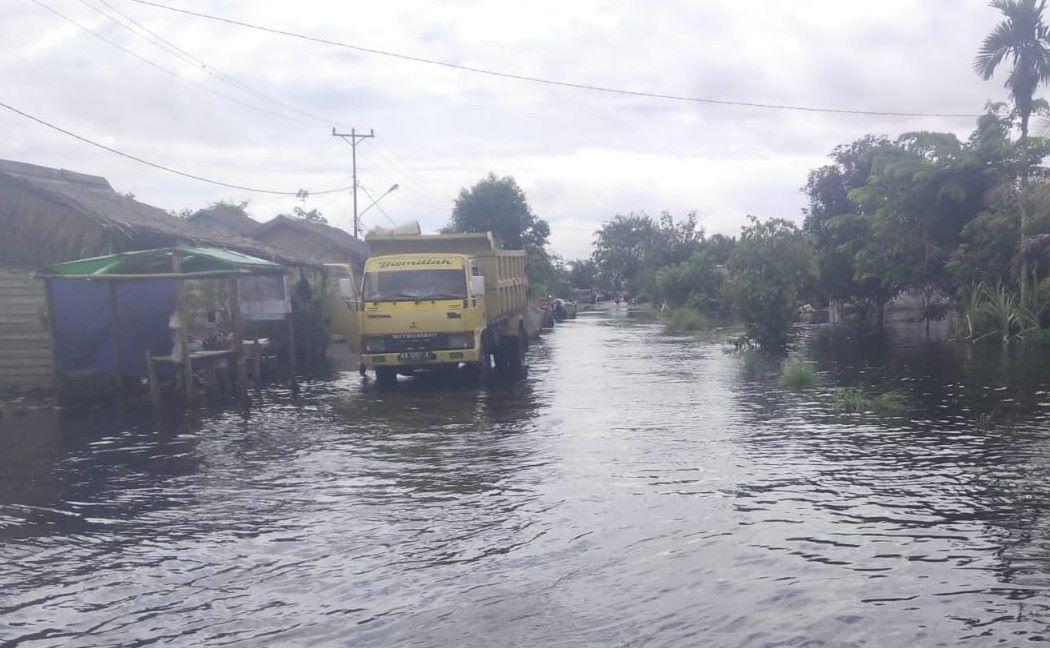 BANJIR : Kondisi banjir merendam lingkungan masyarakat Desa Pasir.