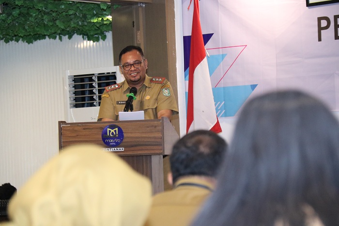 SOSIALISASI: Mohammad Bari memberikan sambutan ketika sosialisasi penyusunan laporan penyelenggaraan pemerintahan daerah.